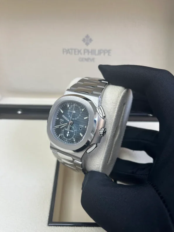 PATEK PHILIPPE NAUTILUS FLYBACK CHRONOGRAPH TRAVEL TIME 40.5MM - Image 8